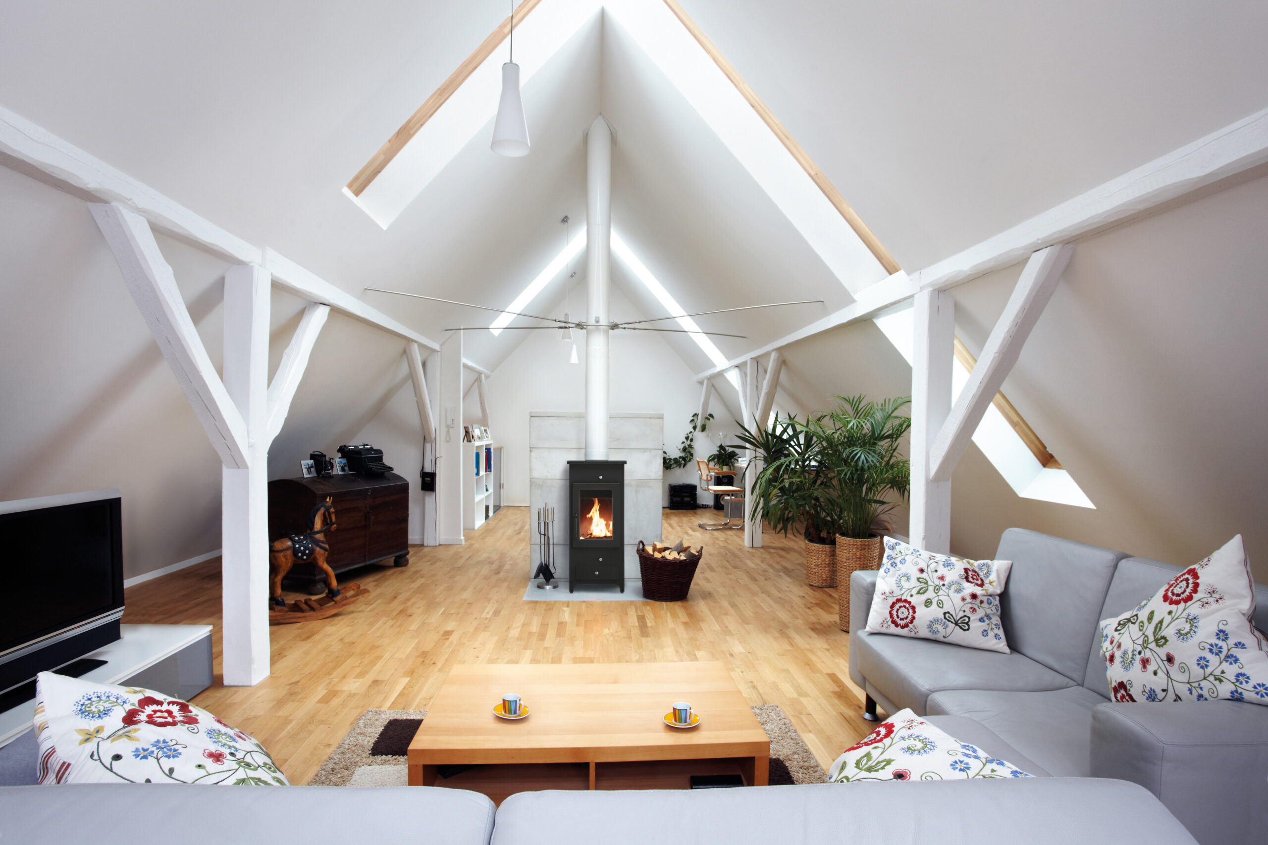 large, attractive attic room with wood-burning fireplace